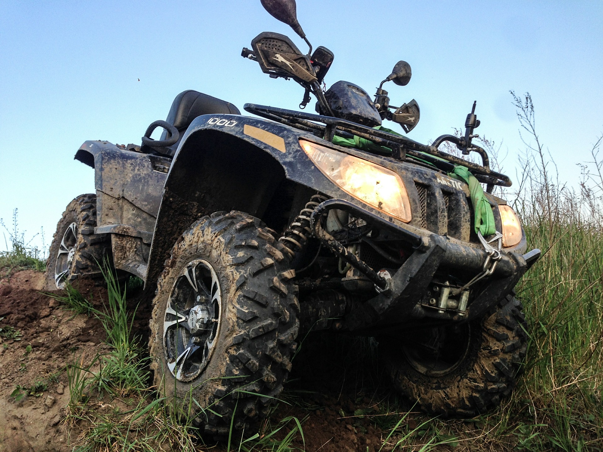 quad bike on a muddy slope. 