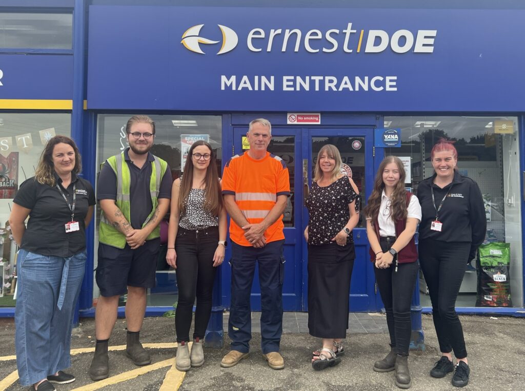 Ernest Doe first aiders stood outside the main entrance to the Ulting depot, with staff from Essex & Herts Air Ambulance