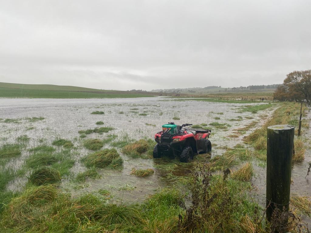 tractor under flood water
