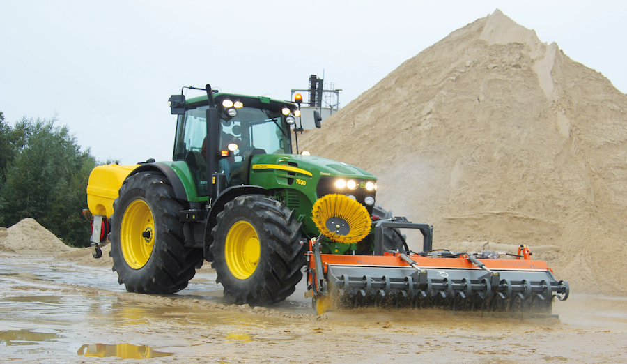 Bema scraper machine attached to a tractor