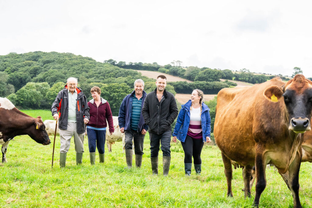 Photo of a family of farmers in a field