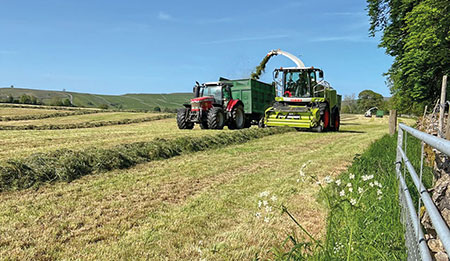 tractor harvesting crops