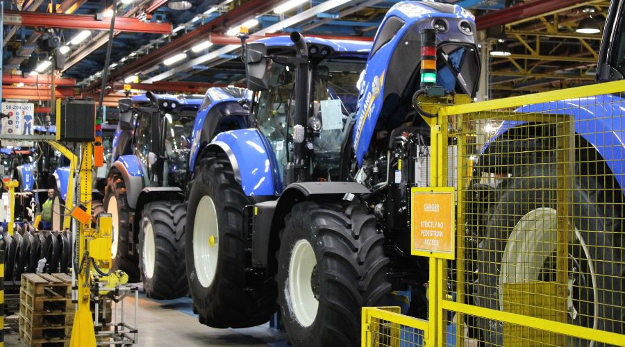New Holland tractors inside tractor factory