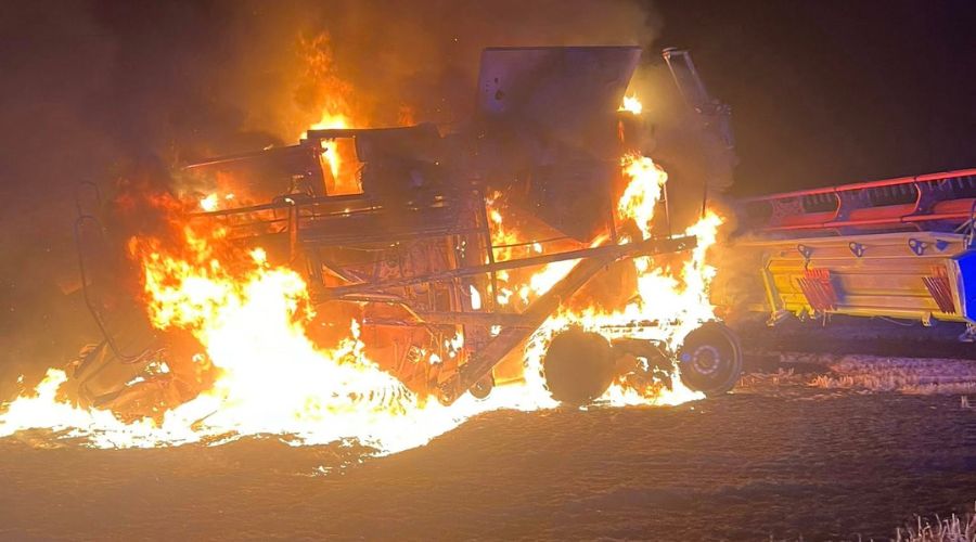 combine harvester on fire