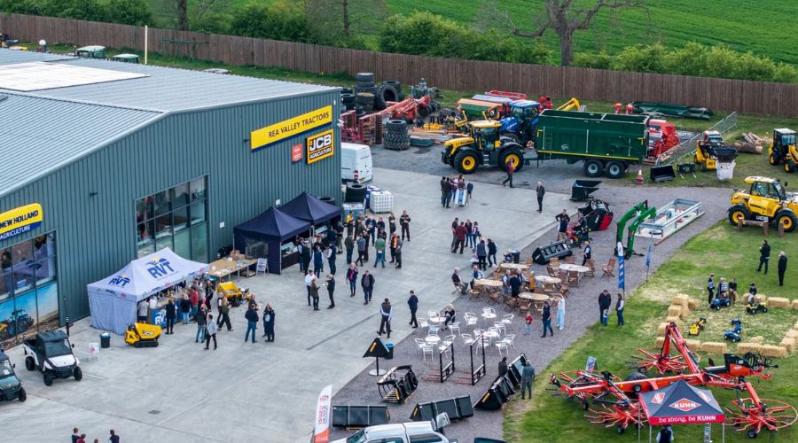 rea valley tractors building with people, stalls and machinery outside for open day