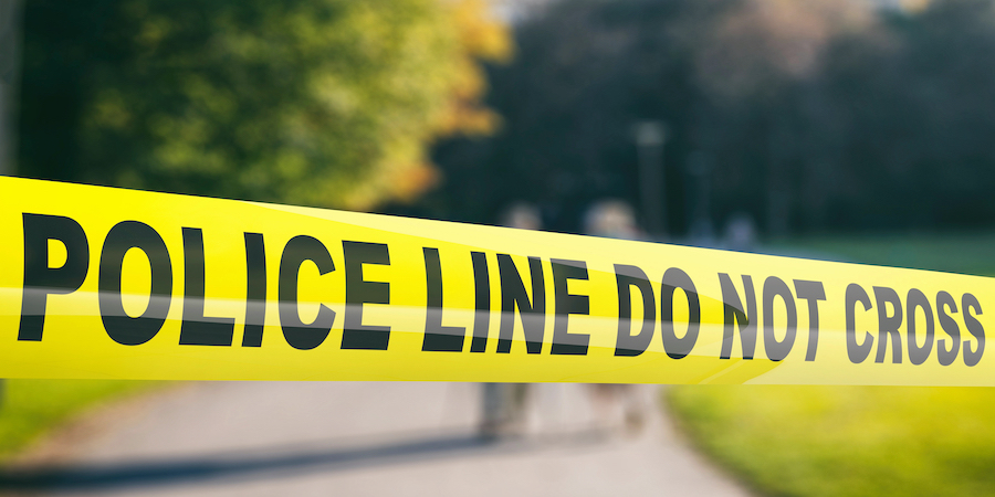 rural scene with police tape across