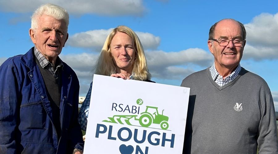 Perthshire senior farmers Douglas Johnston, left, and Douglas Sinclair, right, with Carol McLaren RSABI Chief Executive, middle