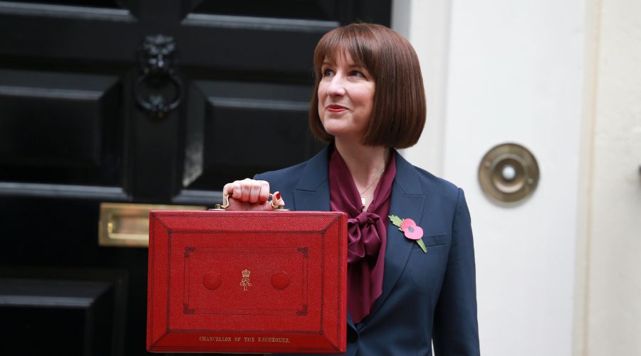 Rachel Reeves outside Downing Street holding red briefcase 