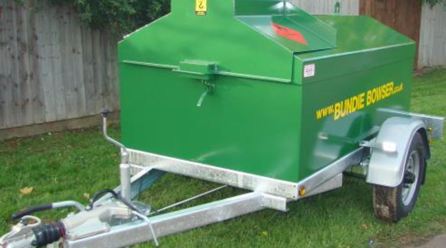 green fuel bowser attached two trailer
