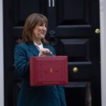 Rachel Reeves outside no 11 Downing Street holding the budget briefcase