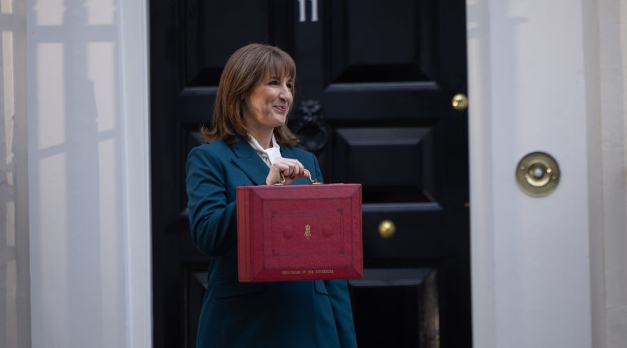 Rachel Reeves outside no 11 Downing Street holding the budget briefcase
