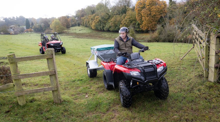 Honda ATV and UTV on working land