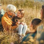 Three generations of a family in field