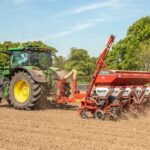 Tractor in field cultivating